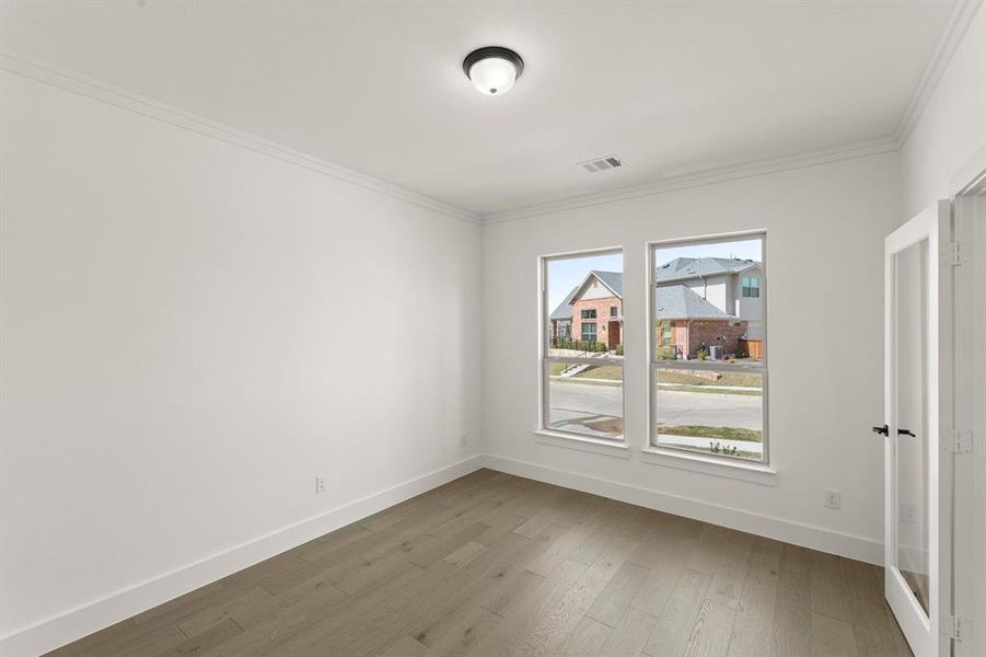 Spacious, unfurnished interior of a new home in Trails at Cottonwood Creek, Rowlett (Image 24).