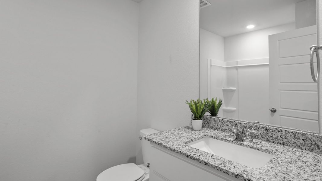 Representative furnished interior of a home built from the DENTON by D.R. Horton in Faculty Row, Abilene (Image 12).