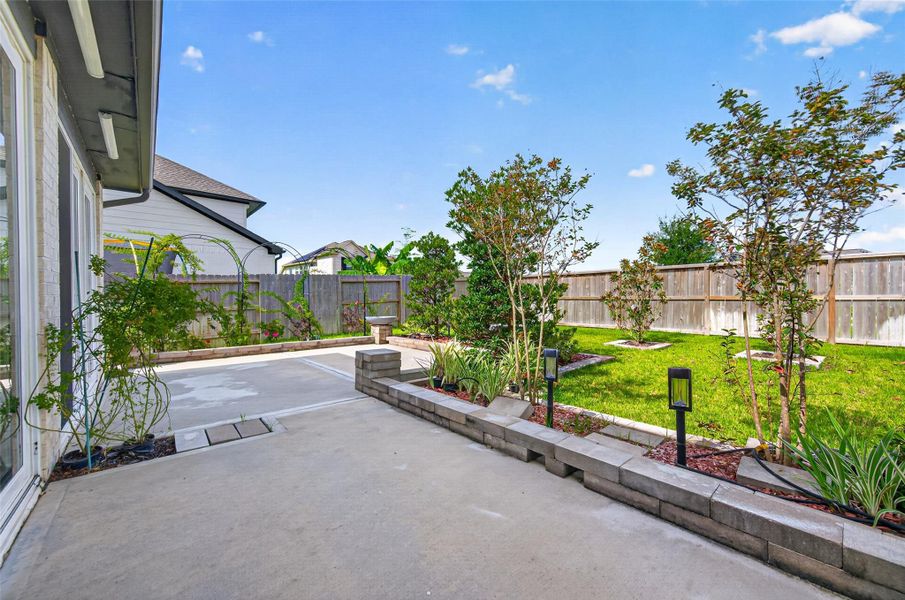 Exterior details and patio area of a home in Sunterra, Katy (Image 23). Exterior details and patio area of a home in Sunterra, Katy (Image 23).