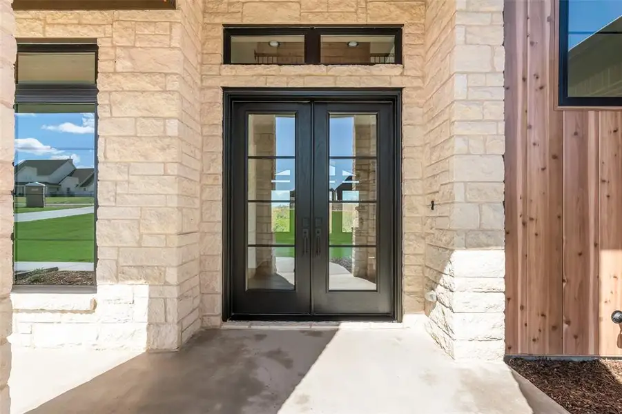 Exterior details and patio area of a home in Eagles Bluff, Hudson Oaks (Image 4).