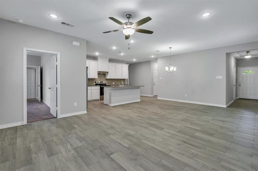 View of open living and dining area.