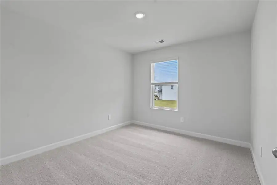 Spacious, unfurnished interior of a new home in Brayfield Manor - Heritage Collection, Wellford (Image 17).