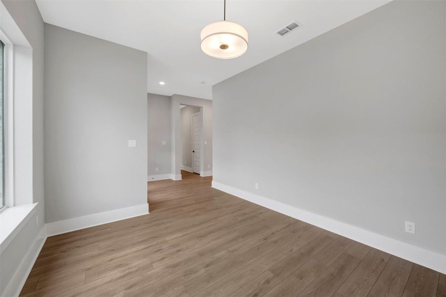 Spacious, unfurnished interior of a new home in Easthaven at Bridgeland Central - Horizon Collection, Cypress (Image 9).