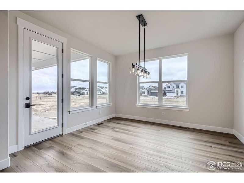 Spacious, unfurnished interior of a new home in RainDance, Windsor (Image 25).