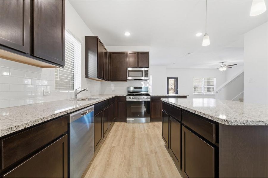 Furnished interior view inside a new home in La Terra, Celina (Image 9).