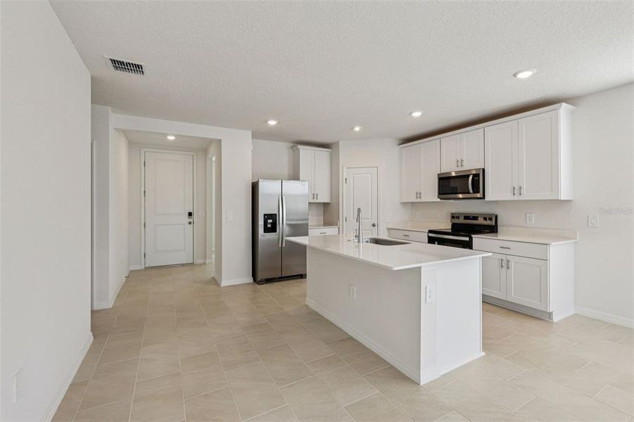Furnished interior view inside a new home in Wynnstone - Signature Series, Davenport (Image 7).