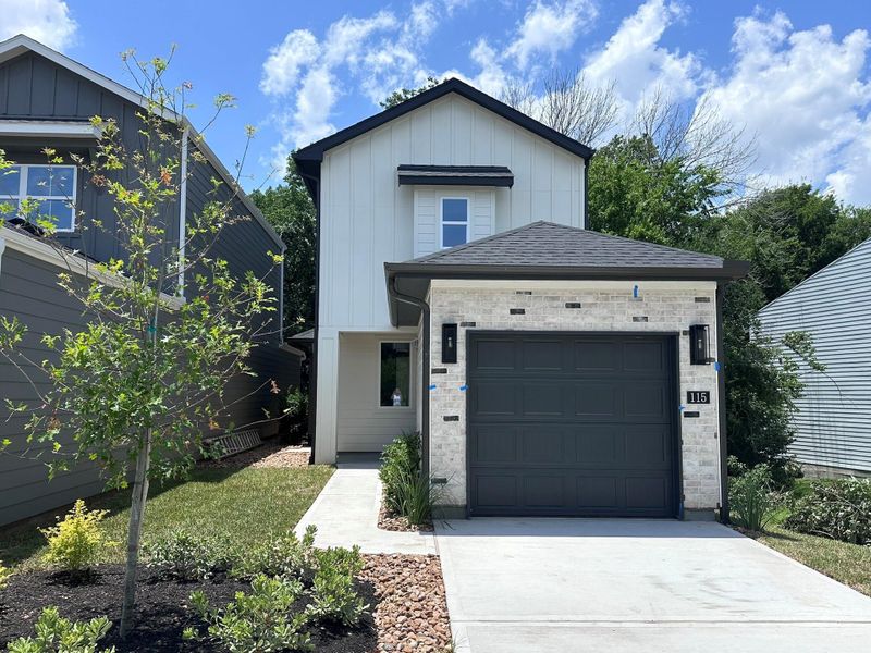 Front exterior of a new home in , Montgomery, TX, highlighting curb appeal (Image 4).