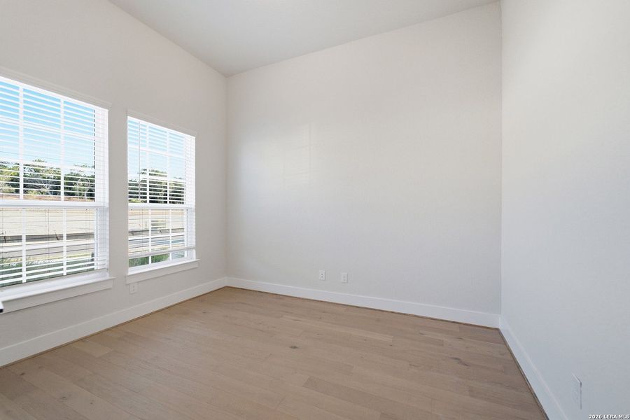 Spacious, unfurnished interior of a new home in The Woodlands at Medina Hills, Mico (Image 33).