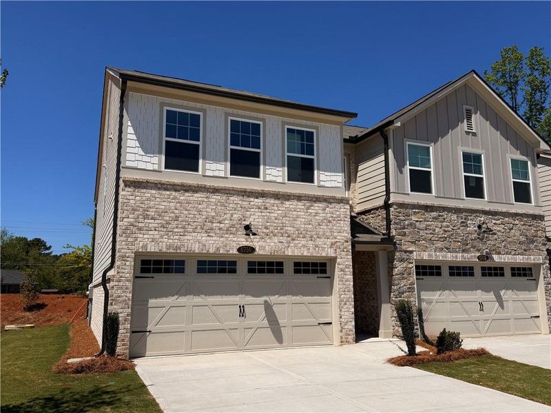 Front exterior of a new home in Leydenview, Mableton, GA, highlighting curb appeal (Image 25).