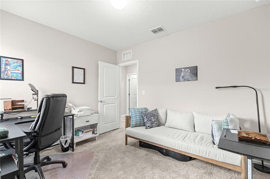 Furnished interior view inside a new home in Del Webb Stone Creek, Ocala (Image 17).