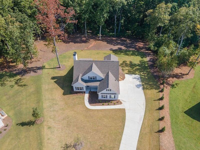 Front exterior of a new home in Highgate, Newnan, GA, highlighting curb appeal (Image 2).