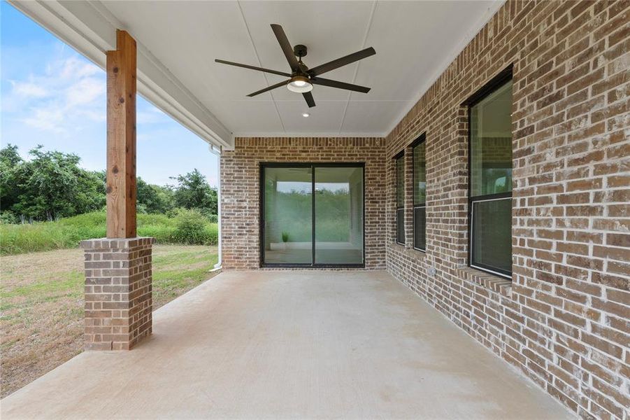 View of patio / terrace featuring a ceiling fan