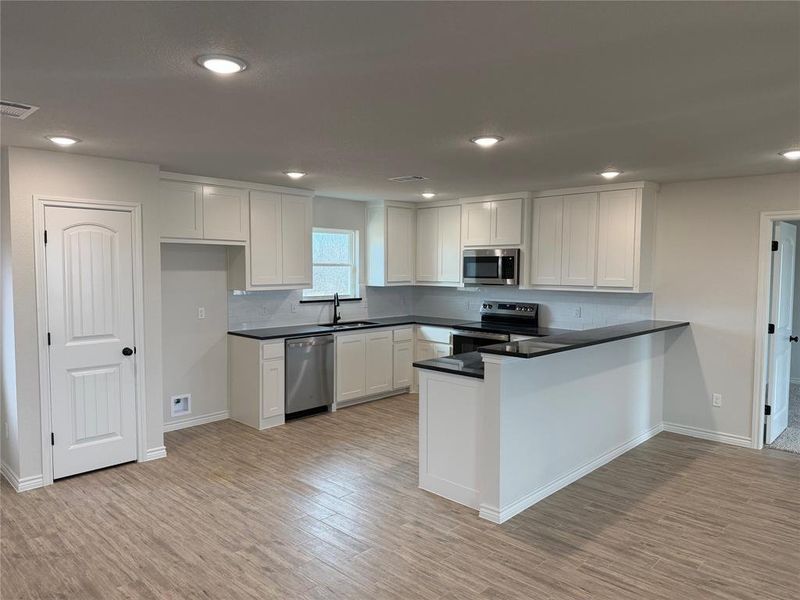 Furnished interior view inside a new home in , Azle (Image 4).