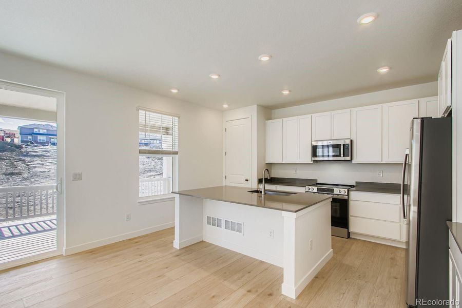Furnished interior view inside a new home in Ken-Caryl Ranch, Littleton (Image 7).
