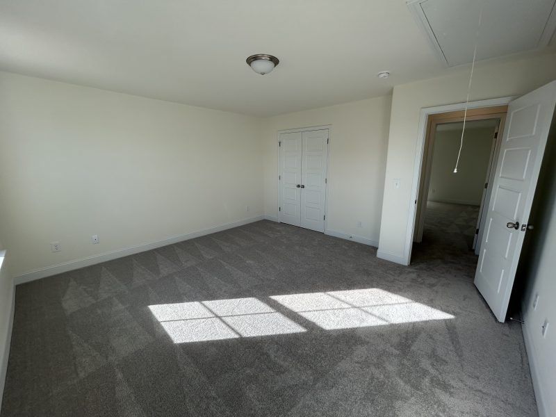 Spacious, unfurnished interior of a new home in Miller's Reserve, Winston-Salem (Image 50).