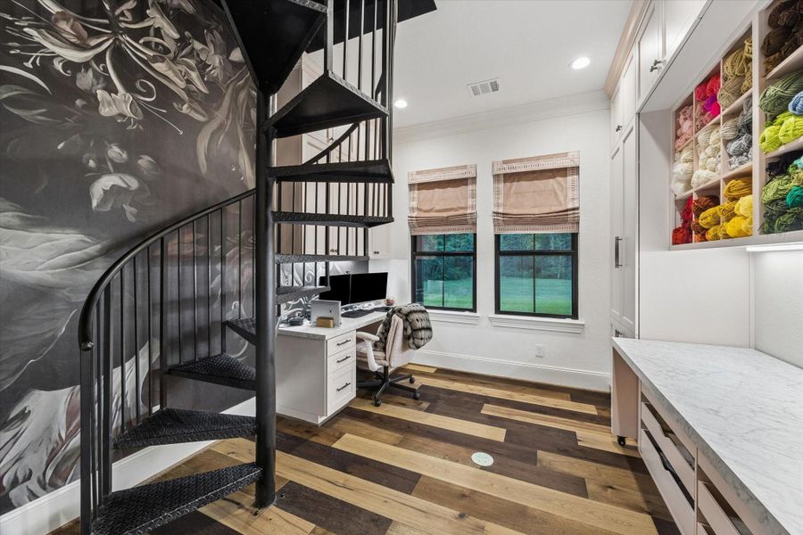 Designed to inspire creativity, this exceptional studio blends sophisticated design with remarkable functionality. Custom carpenter-crafted built-ins, generous storage, and abundant natural light create a refined space equally suited as a private library, executive office, design studio, or artist's retreat. Every detail reflects the home's commitment to craftsmanship, organization, and timeless elegance.