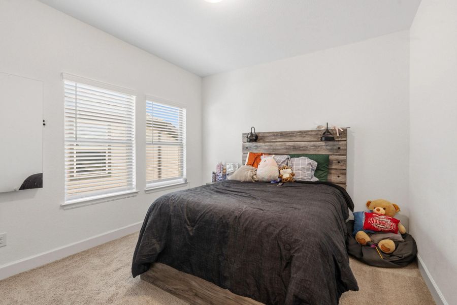 Generously sized secondary bedroom offering versatility for family or guests