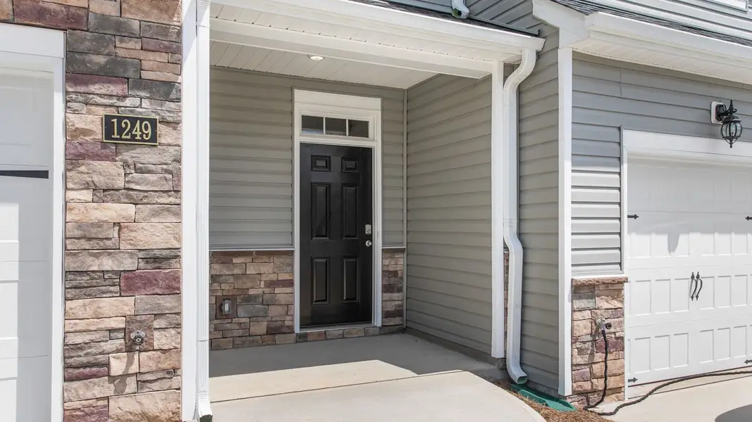 Exterior details and patio area of a home in The Grove at Glennview, Kernersville (Image 18).