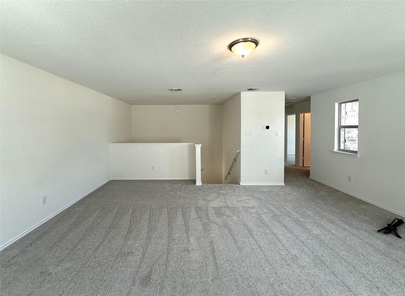 Spacious, unfurnished interior of a new home in River Bluff, Leander (Image 20).