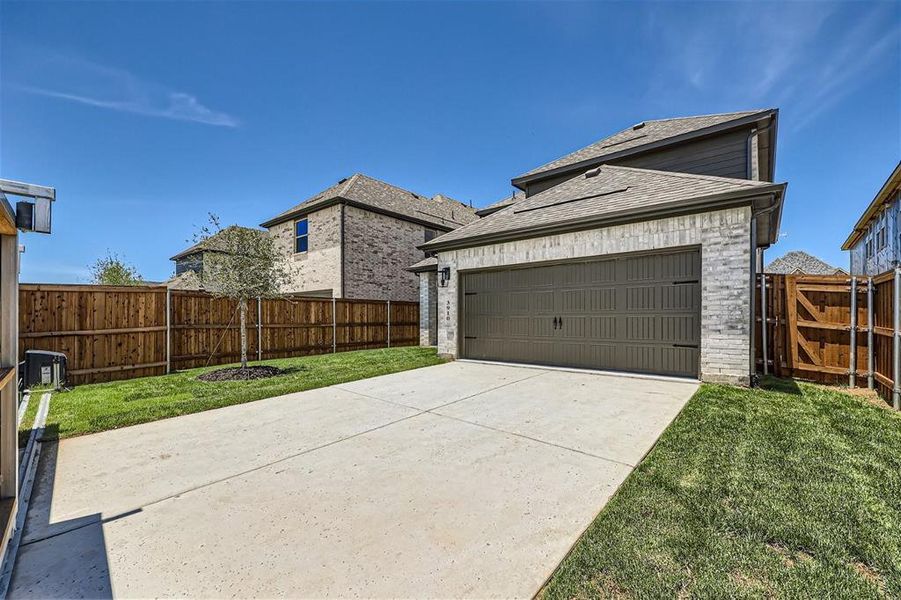 Garage with a lawn