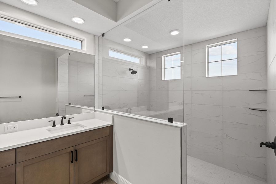 Representative furnished interior of a home built from the Weston Signature by GHO Homes in High Pointe, Vero Beach (Image 20).