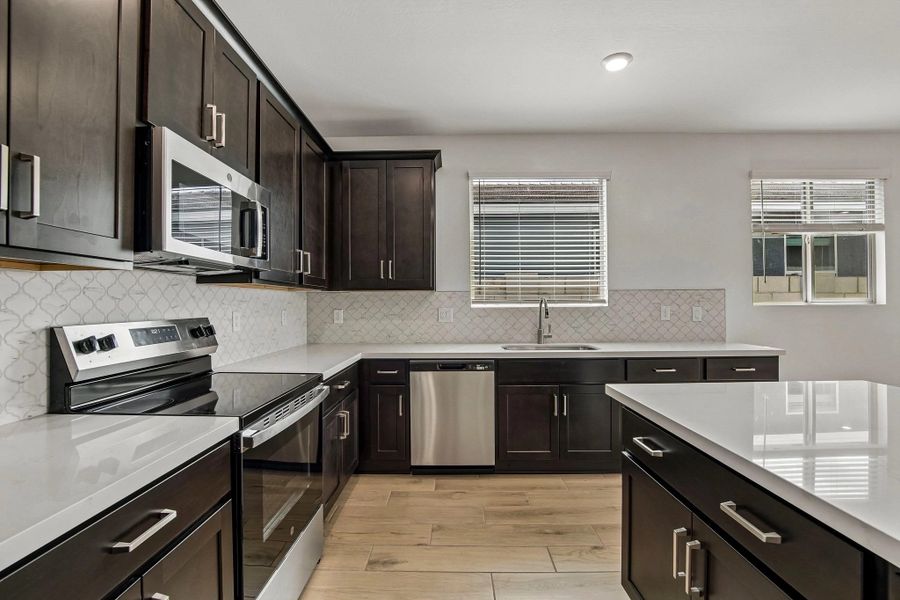 Kitchen featuring the Roosevelt Collection. Not actual home, finishes may vary by community.