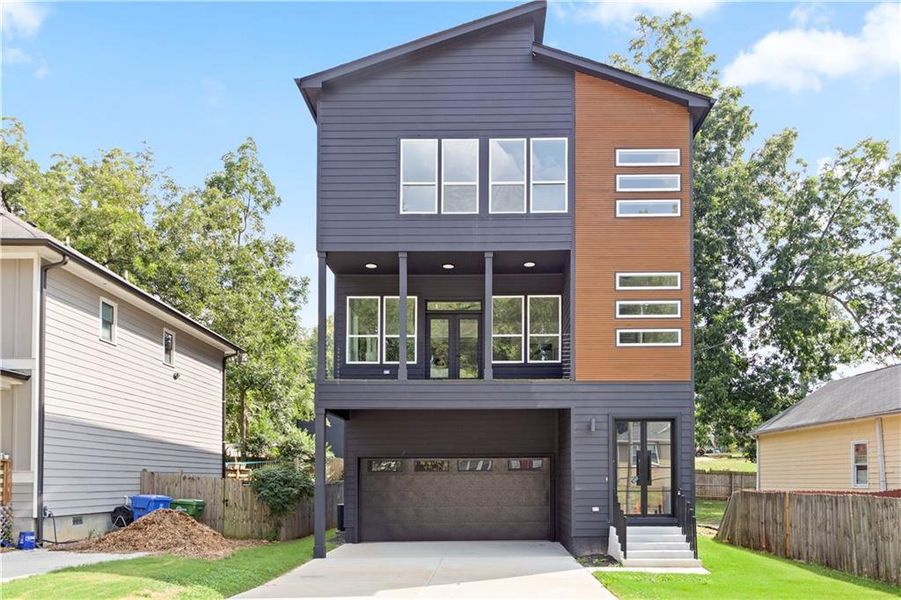 Front exterior of a new home in , Atlanta, GA, highlighting curb appeal (Image 24).