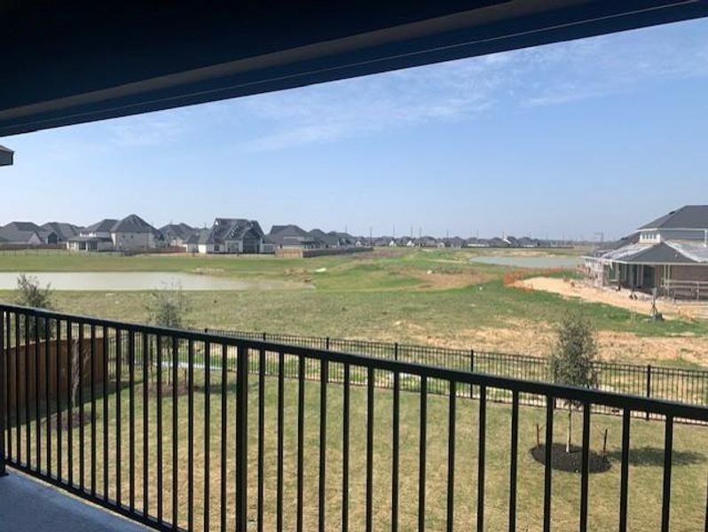 Exterior details and patio area of a home in Dunham Pointe, Cypress (Image 22).