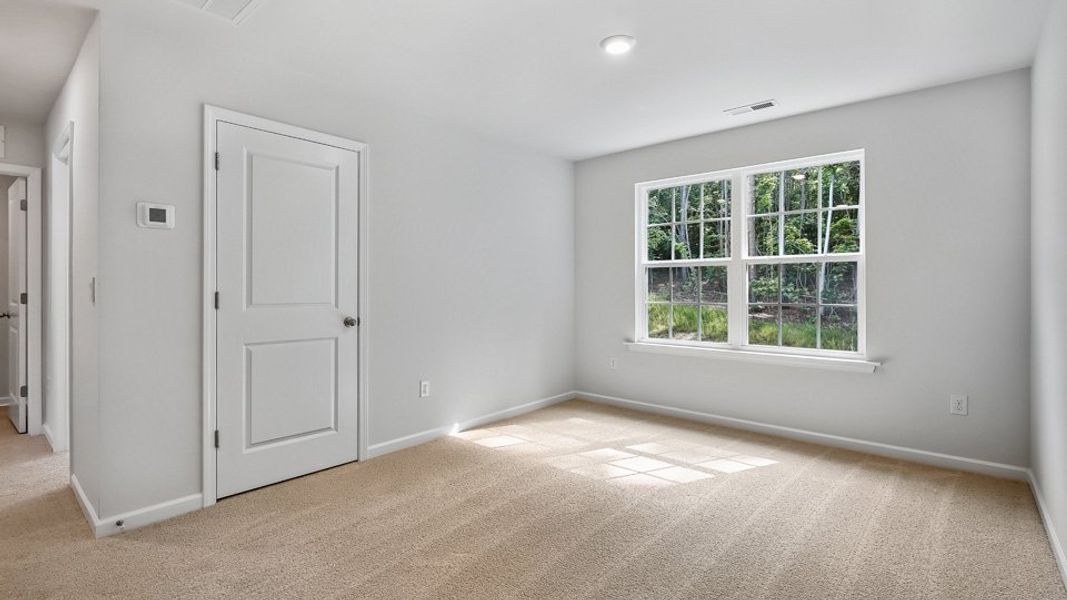 Spacious, unfurnished interior of a new home in The Landing at Summerhaven, Mebane (Image 27).