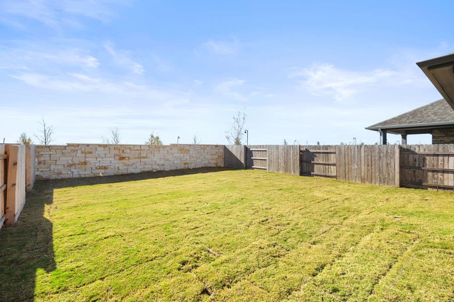 Exterior details and patio area of a home in Flora, Hutto (Image 24).