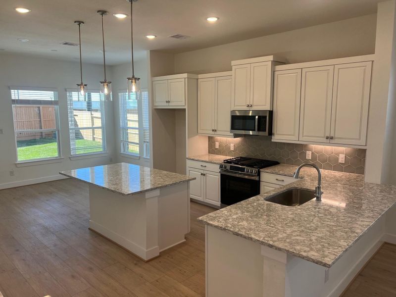 Furnished interior view inside a new home in Wood Leaf Reserve, Tomball (Image 4).