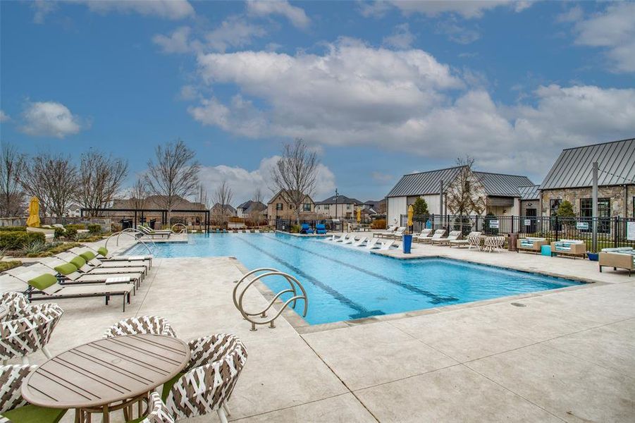 One of the community swimming pool featuring a patio area