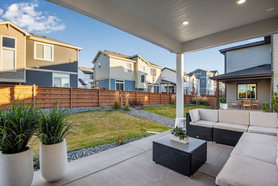 Exterior details and patio area of a home in Reunion, Commerce City (Image 20).
