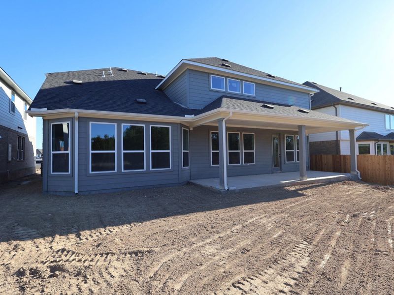 Exterior details and patio area of a home in Edgewood, Leander (Image 2). Exterior details and patio area of a home in Edgewood, Leander (Image 2).