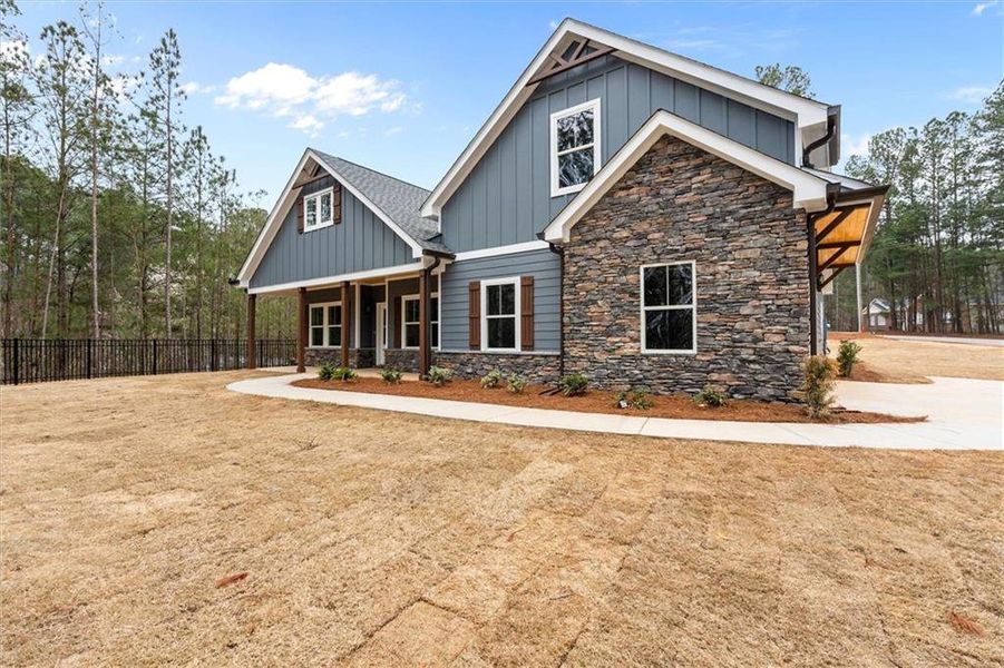Front exterior of a new home in , Villa Rica, GA, highlighting curb appeal (Image 21).