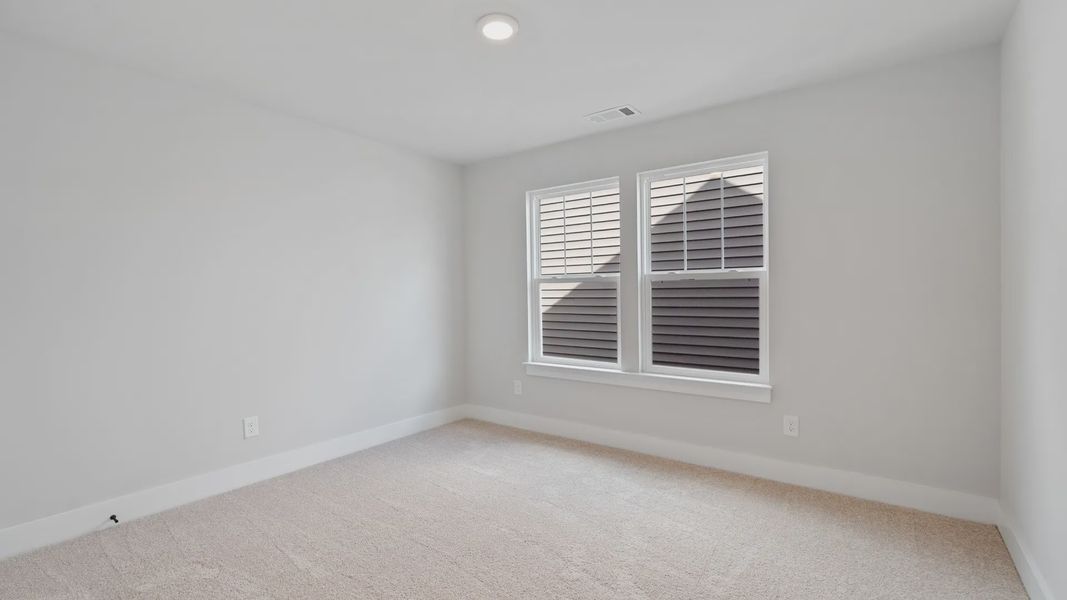 Representative furnished interior of a home built from the Stonefield - Finished Basement by DRB Homes in Pinebrook, Woodruff (Image 30).