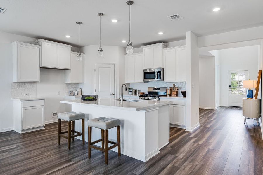 Representative furnished interior of a home built from the Wren by Taylor Morrison in Turner's Crossing 50s, Austin (Image 5).
