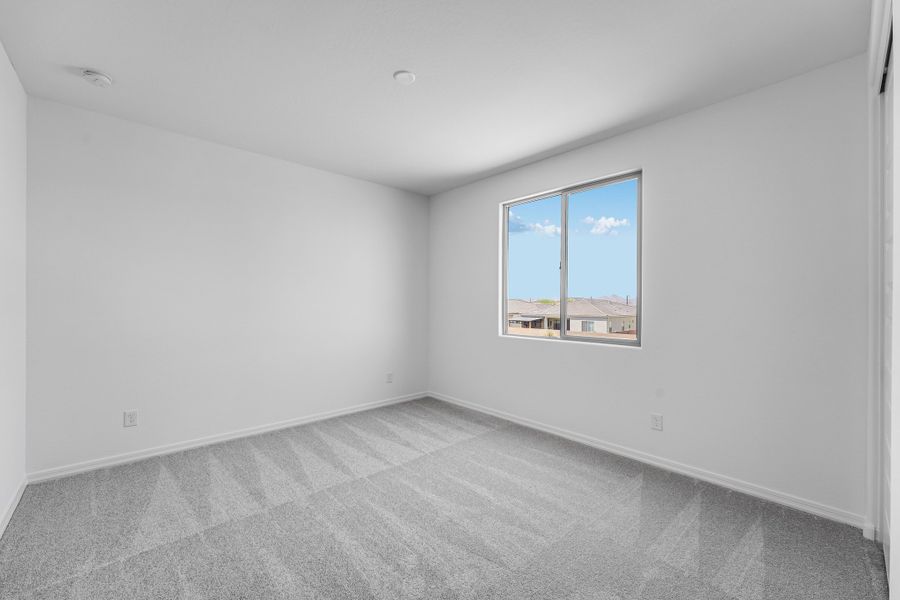 Spacious, unfurnished interior of a new home in Combs Ranch, San Tan Valley (Image 26).