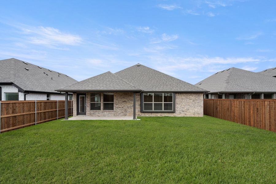 Exterior details and patio area of a home in Silo Mills, Joshua (Image 22).