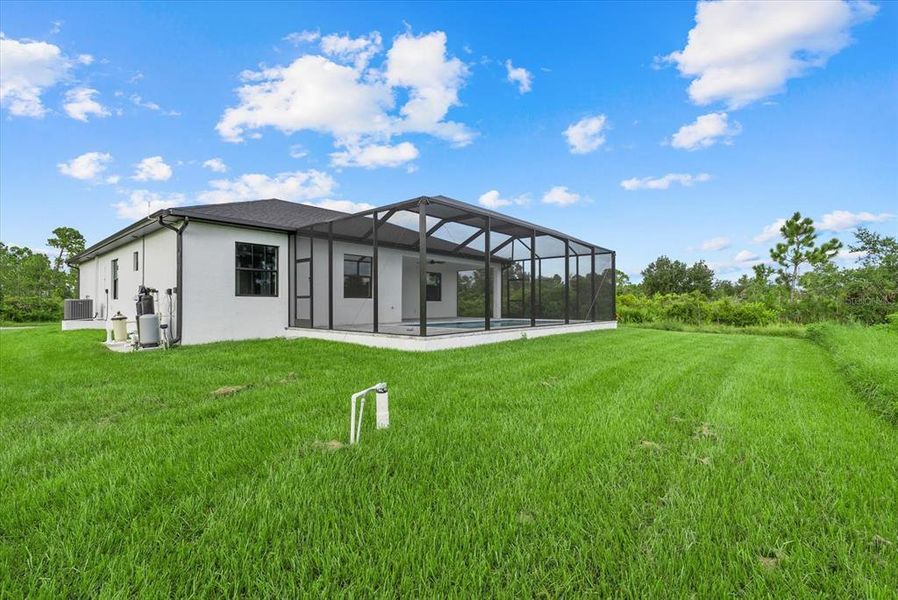 Front exterior of a new home in , Port Charlotte, FL, highlighting curb appeal (Image 30). Front exterior of a new home in , Port Charlotte, FL, highlighting curb appeal (Image 30).