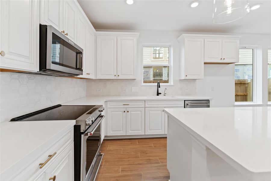 Furnished interior view inside a new home in Sunterra, Katy (Image 8).