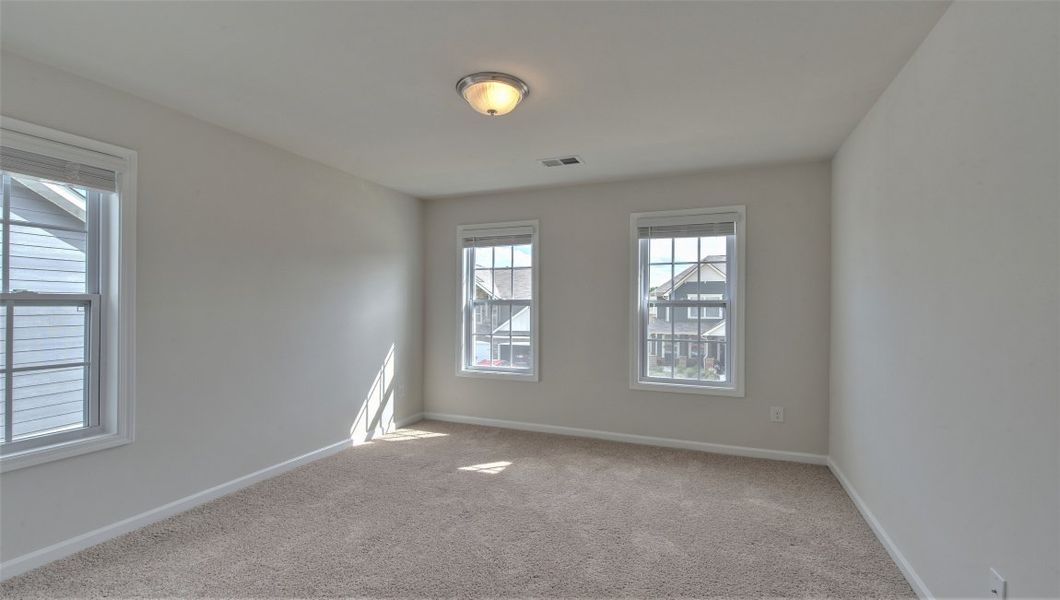 Spacious, unfurnished interior of a new home in Reserve at Tap Root Farms, Fletcher (Image 26). Spacious, unfurnished interior of a new home in Reserve at Tap Root Farms, Fletcher (Image 26).