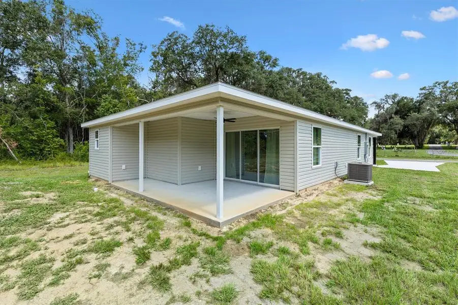 Exterior details and patio area of a home in , Bushnell (Image 3).