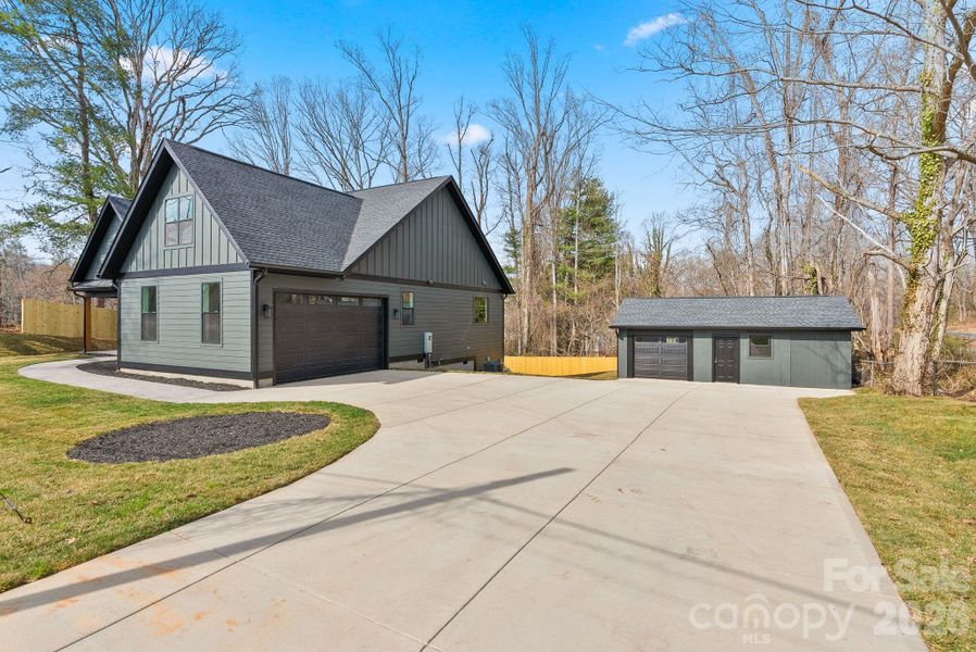 Front exterior of a new home in , Asheville, NC, highlighting curb appeal (Image 30).