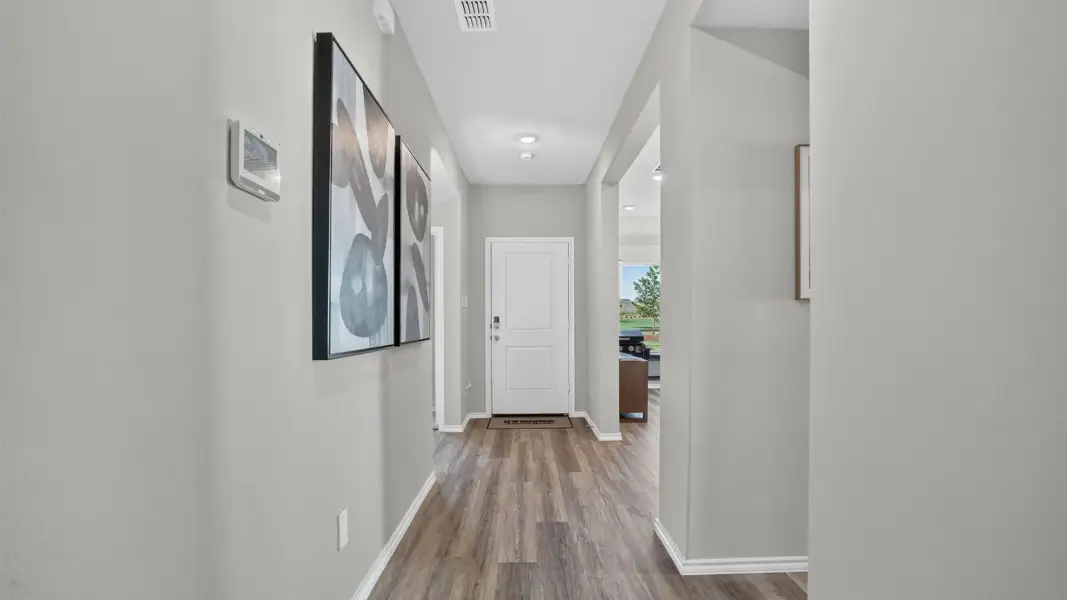 Representative unfurnished interior of a home built from the Justin by D.R. Horton in Hadley Farms, Godley (Image 23).