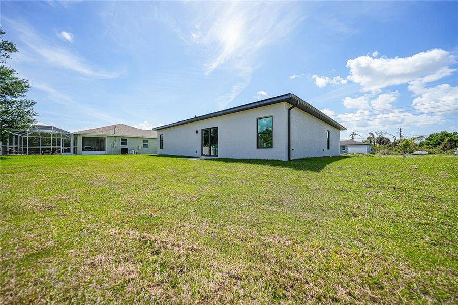 Exterior details and patio area of a home in , Port Charlotte (Image 29).