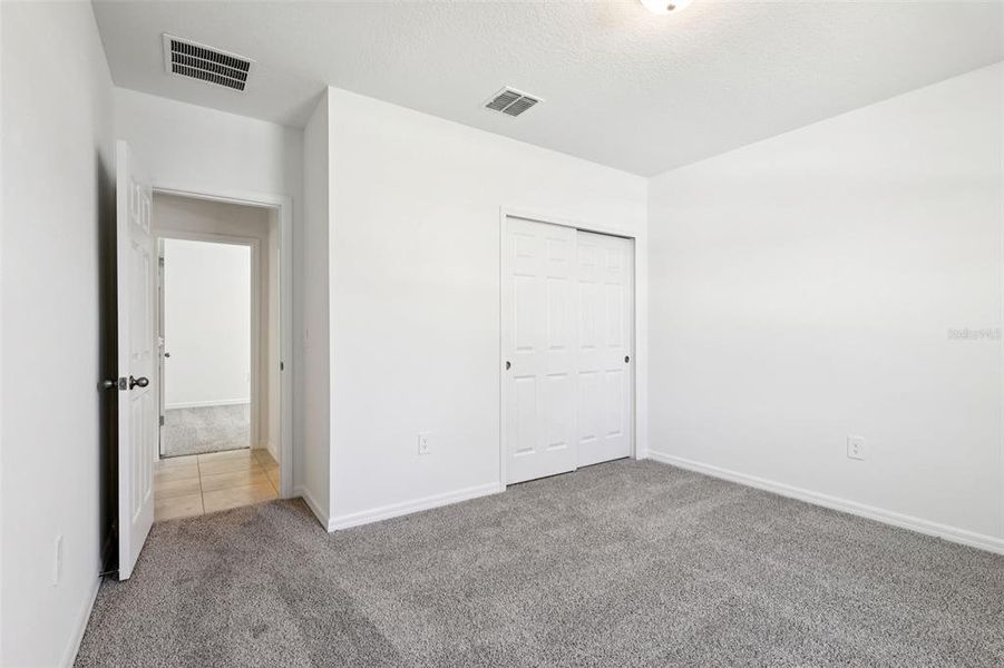 Spacious, unfurnished interior of a new home in Deer Run at Crosswinds, Davenport (Image 31).