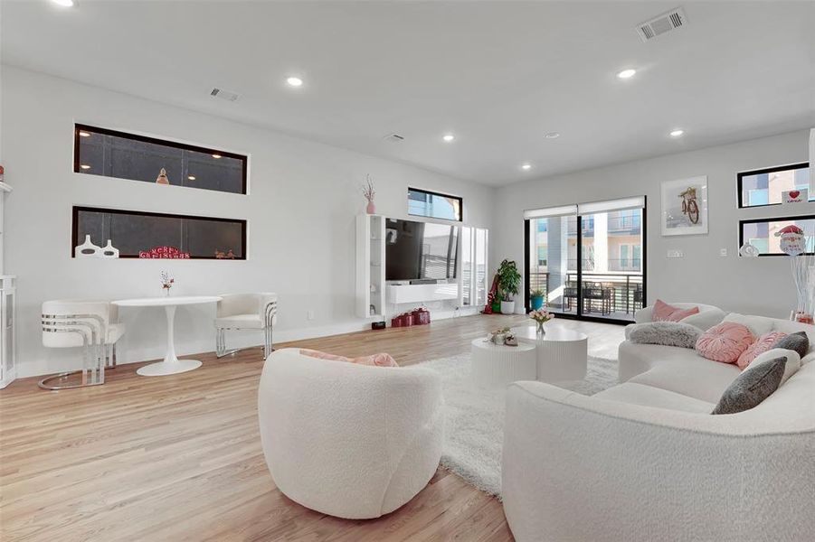 Living room featuring light hardwood / wood-style flooring