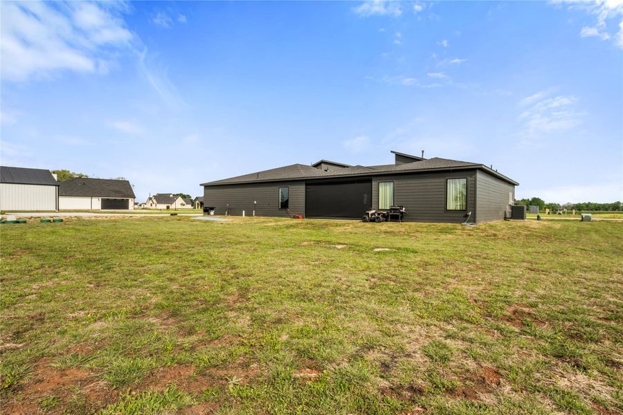 Exterior details and patio area of a home in , Sealy (Image 24).