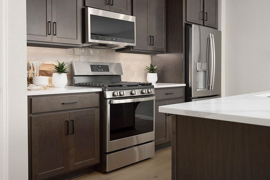 Representative furnished interior of a home built from the 1543 Modeled by KB Home in Legato, Commerce City (Image 3).